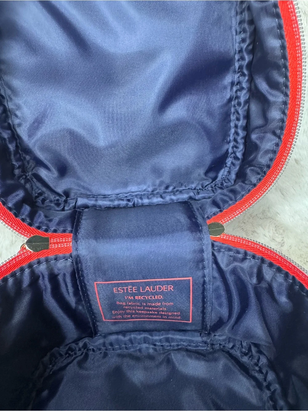 Estée Lauder Navy Floral Wristlet Cosmetic Case with Red Trim